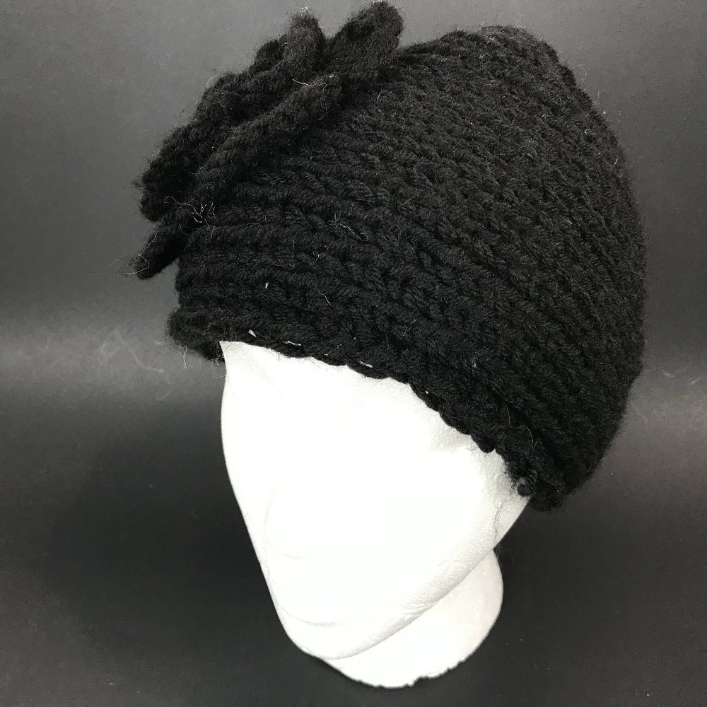 Wool blend black hand knit headband with flower accent